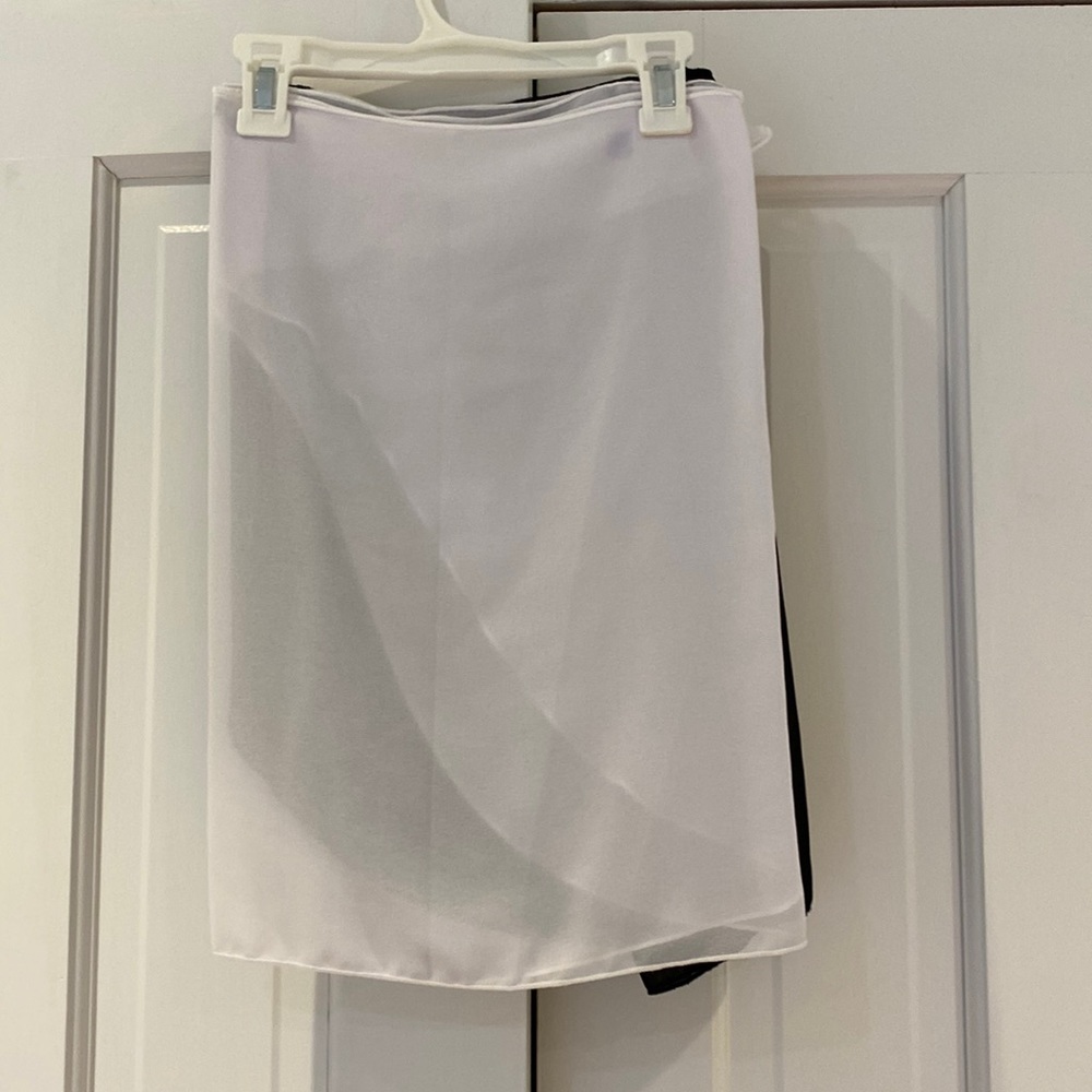 2 sarongs - 1 black, 1 white, transparent, 100% polyester. Size M. Barely worn.